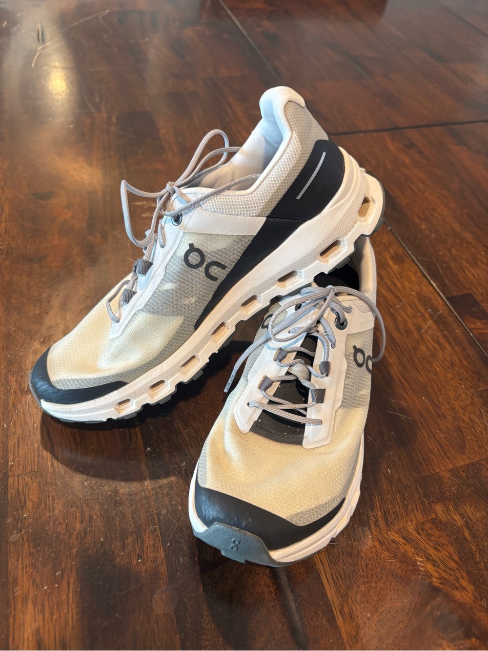On Running Women's White and Black Cloudrunning Sneakers